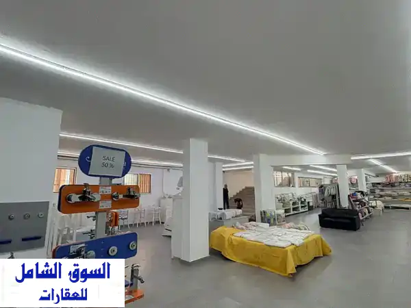 امتلك استثمارك الذهبي: مستودع فسيح 400م² في...