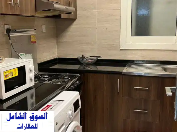 فرصة العمر للتملك الكاش: شقة غرفة وصالة فاخرة بأبراج الواحة | إطلالة ساحرة وموقع حيوي بسعر 480 ألف درهم