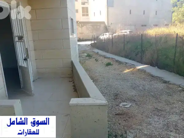 شقة فاخرة للبيع في عمشيت مع قطعة أرض خاصة | 2 غرف نوم...