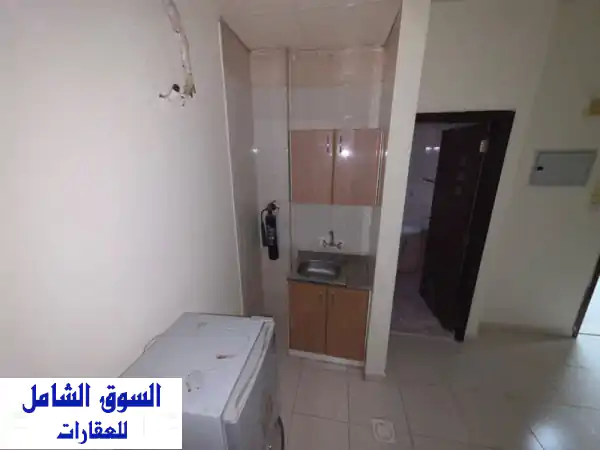 فرصة سكنية مميزة: استوديو للإيجار السنوي بالراشدية عجمان - 15 ألف درهم على 6 دفعات! قرب جراند مول والسفير مول - مثالي لك!