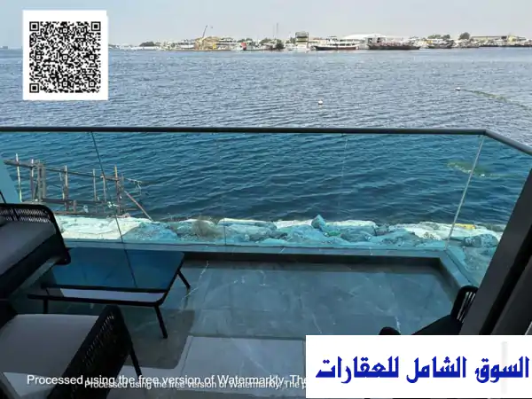 شقة فاخرة للبيع في أبراج كريك تاورز عجمان: إطلالة مباشرة على خور عجمان | استثمار ذهبي بدون رسوم تسجيل!