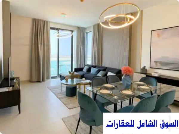 شقة فاخرة للبيع الشارقة: إطلالة بحرية كاملة | مقدم 10% فقط، تقسيط مريح | مشروع الواجهة المائية الحمرية