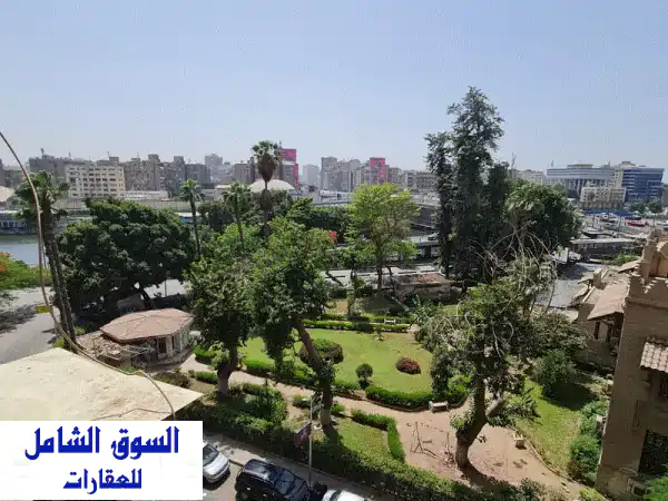 شقة فاخرة ٣ غرف نوم بإطلالة جزئية على النيل -...