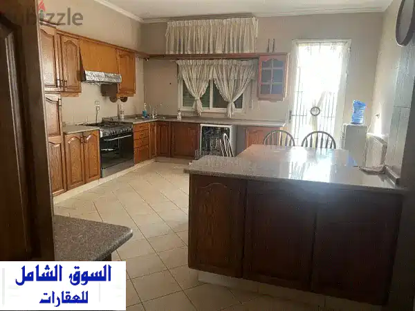 شقة مفروشة فاخرة للإيجار في ضاحية الرشيد | أرضي بحديقة خاصة!