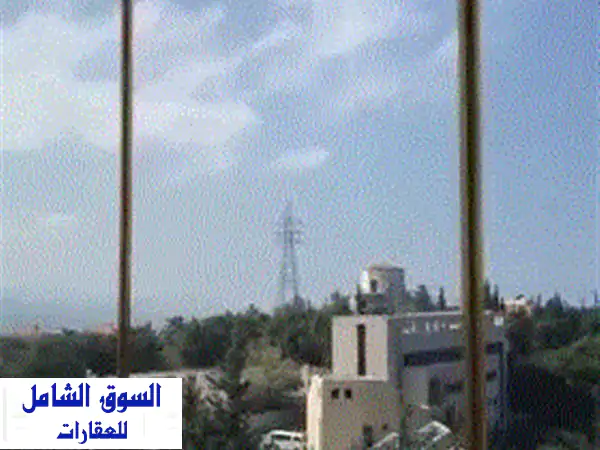شقة فاخرة للبيع في أدما - إطلالة خلابة و تشطيب...
