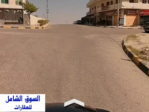 فرصة استثمارية ذهبية! قطعة أرض 5500م² في قرية سالم - واجهة تجارية مميزة