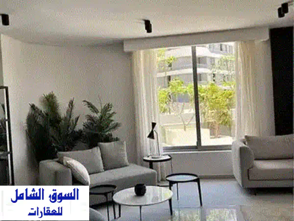 دوبلكس فاخر 4 غرف + حديقة خاصة للبيع في تاج سيتي - القاهرة الجديدة | خلف الميراج مول