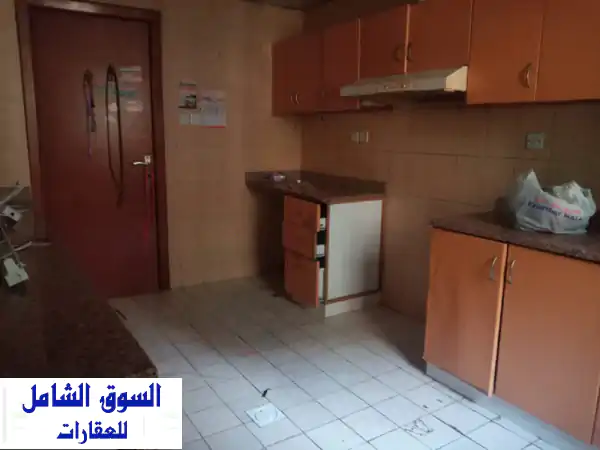 شقة غرفتين وصالة للإيجار السنوي بأبراج الراشدية - عجمان | موقع مثالي ومساحة واسعة