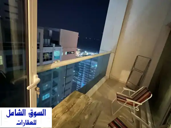 شقة بحرية رائعة للبيع في أبراج عجمان وان - غرفتين وصالة + مواقف - فرصة ذهبية!