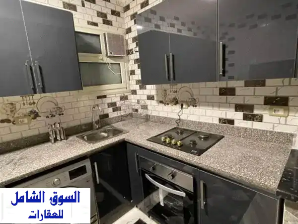شقة فاخرة مفروشة للإيجار اليومي والشهري في المهندسين -  راحة منزلية وسط المدينة!