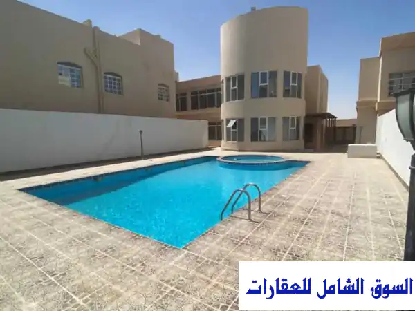 شقة واسعة للإيجار في أم صلال علي - نصف فيلا بمسبح!...