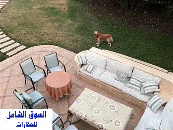 فيلا فاخرة للإيجار في مارينا 4 بالساحل الشمالي - حديقة خاصة وبحيرة خلابة!