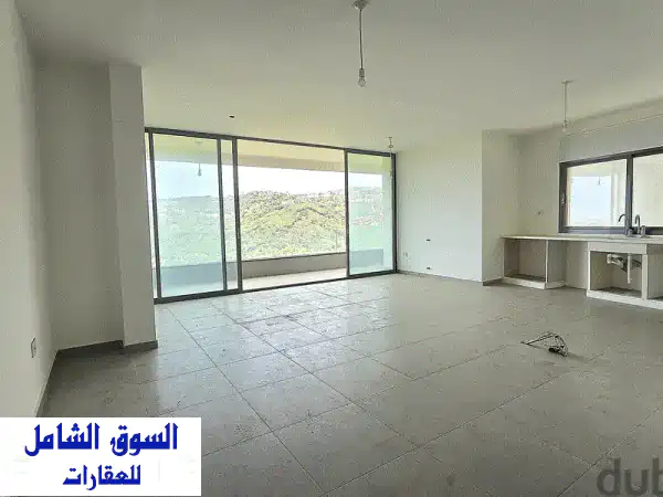 شقة فاخرة للبيع في زكريت - إطلالة جبلية خلابة! (RWRNH48)