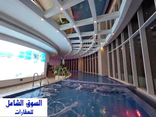 شقة فاخرة مفروشة للبيع في السيف - مشروع Spiral Orchid - إطلالة بحرية خلابة!