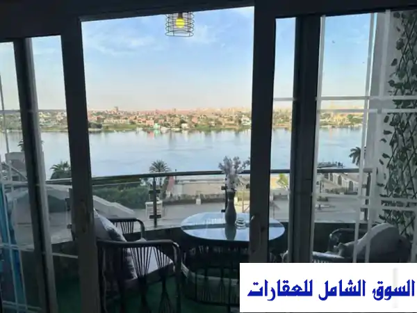 شقة فندقية فاخرة للإيجار اليومي والشهري على كورنيش المعادي - إطلالة خلابة على النيل والأهرامات!