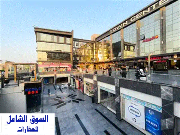 استثمر الآن! محل تجاري 88 متر واجهة مميزة أمام الجامعة الفرنسية - فرصة ذهبية!