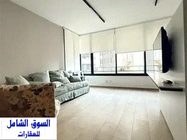 شقة عصرية فاخرة للإيجار في الأشرفية - مساحة واسعة و تصميم رائع!
