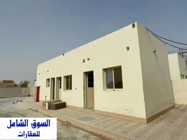 أرض صناعية مسورة للإيجار السنوي في الصجعة - الشارقة (12000 قدم مربع)