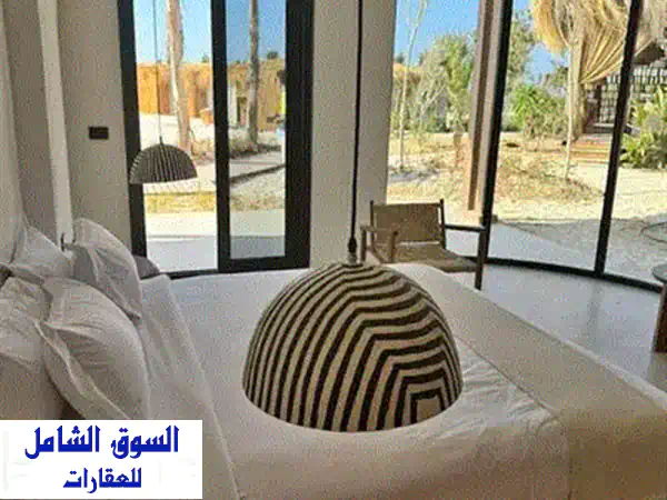 شاليه أرضي فاخر بحديقة خاصة على البحر في أمواج - الساحل الشمالي