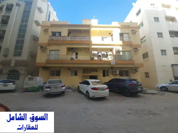 بناية تجارية مؤجرة بالكامل في البوظينة - الشارقة |...