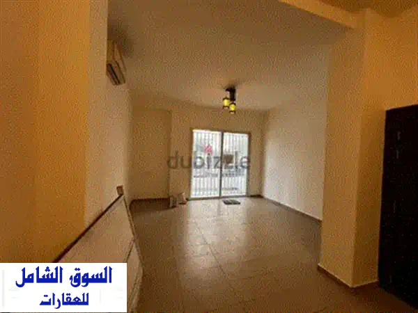 شقة فاخرة للبيع في الأشرفية | 130م² + حديقة 40م² | موقع متميز