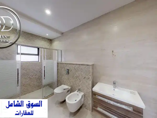 شقة شبه أرضي فاخرة للبيع في طريق المطار - مساحة 240م + حديقة 200م! ✨