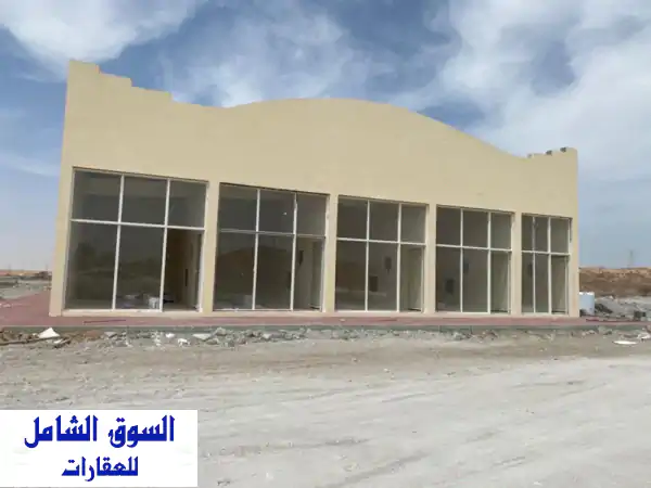 فرصة استثمارية ذهبية! مبنى تجاري للبيع في عجمان - المنامة - موقع استراتيجي