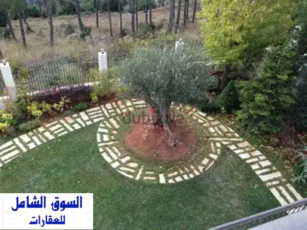 شقة فاخرة للبيع في منطقة المطيلب - مساحة واسعة وحديقة خاصة!