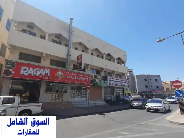 بناية تجارية استثمارية رائعة في المحرق - دخل مضمون و موقع استراتيجي!