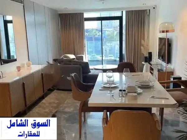 شقة بتشطيب و بخدمات فندقية للبيع بداخل ماريوت...