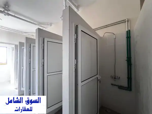 فرصة استثمارية رائعة! مبنى سكني جديد + محلات تجارية في عسكر - 350,000 دينار بحريني