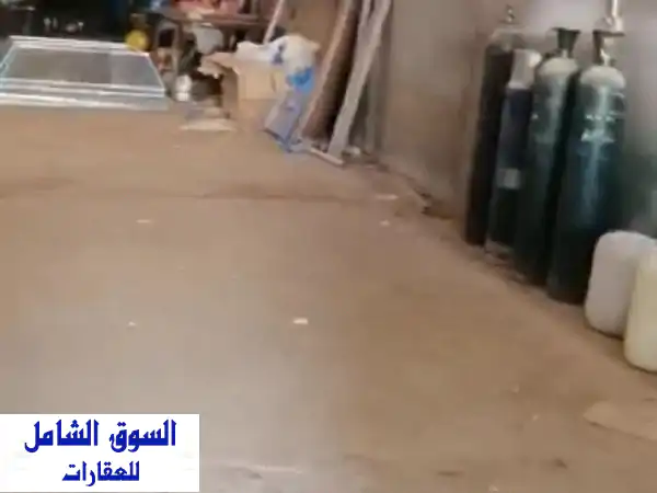 مستودع للإيجار في الهملة - موقع استراتيجي ومساحة واسعة!