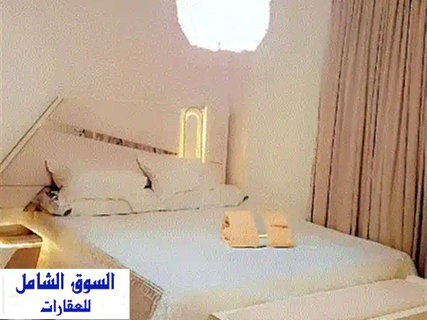 شقة مفروشة فاخرة للإيجار في كمبوند ون قطامية - الدائري المعادي | غرفتين نوم واسعتين