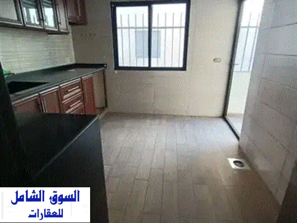 شقة فاخرة 135 متر مربع في عين الرمانة - فرصة استثمارية رائعة!