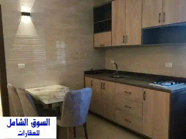 شقة دافئة ومفروشة بالكامل في قلب [اسم المنطقة] -  راحة منزلك بعيداً عن منزلك!