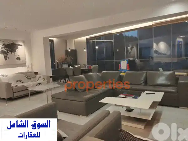 شقة فاخرة للبيع في أدما - إطلالة بحرية خلابة!