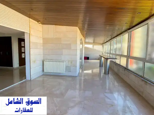 شقة فاخرة للبيع في حارة صخر - إطلالة بانورامية...