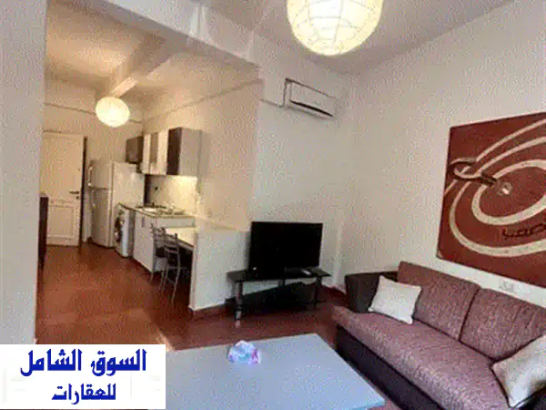 شقة مفروشة أنيقة في مينا الحصن - إطلالة ساحرة وراحة فاخرة!