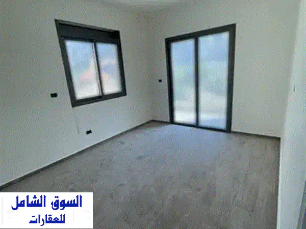 شقة فاخرة للبيع في عين عار - إطلالة جزئية على البحر! قرب IC School