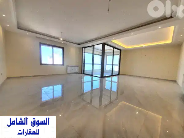 شقة فاخرة للبيع في عين عار - إطلالة جزئية على البحر!...