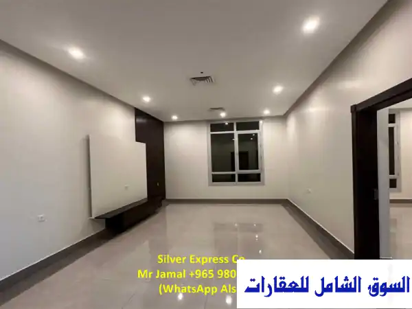 شقة جديدة كلياً بغرفتي نوم رئيسيتين للإيجار في...