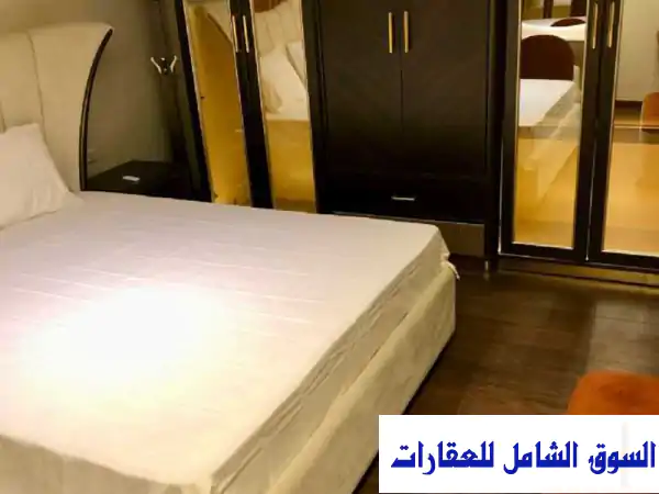 شقة فاخرة للبيع في الدقي - 230م²، إطلالة مميزة على نادي الصيد!