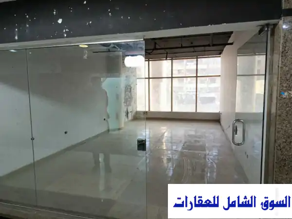 محل تجاري للإيجار بموقع متميز في مزار مول - شارع...