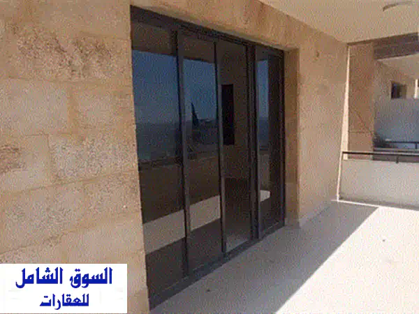 دوبلكس فاخر للبيع في كفور - إطلالة خلابة على البحر والجبل!