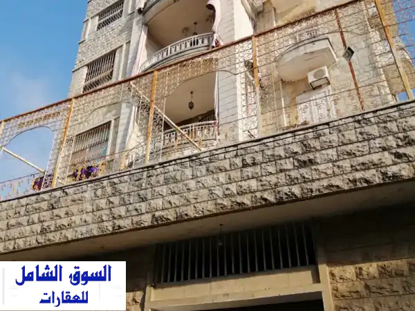 بناية فاخرة للبيع في بحمدون - 4 شقق + 4 محلات تجارية - فرصة استثمارية مميزة!