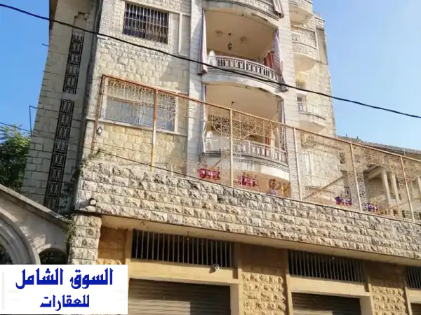 بناية فاخرة للبيع في بحمدون - 4 شقق + 4 محلات تجارية...