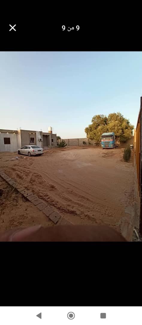 قطعه ارض بها منزل للبيع
