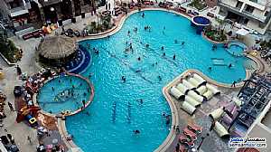 امتلك شقتك داخل واحد من أفضل منتجعات شاطئ النخيل Holiday Resort منتجع هوليداي
