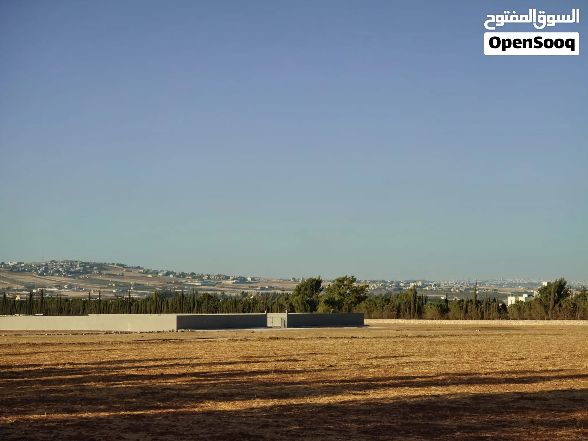 أرض مميزة للبيع منجا بجانب kings academy حوض بركة عمشا مساحة 4050 متر على شارعين