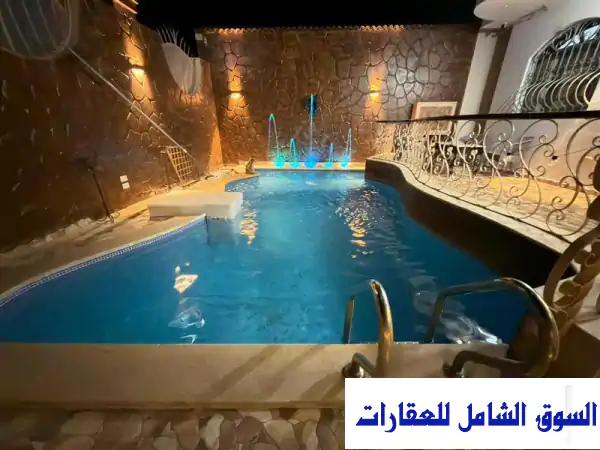 استمتع بالرفاهية المطلقة: فيلا الملكة الفاخرة للبيع في دهب، جنوب سيناء | إطلالات بانورامية ومسبح خاص